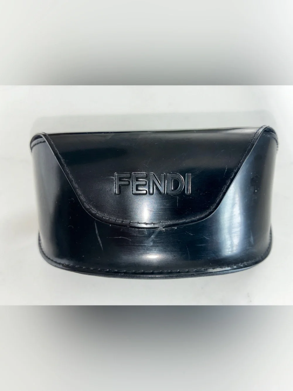Fendi sleek sunglasses with Swarovski crystals embedded in logo.